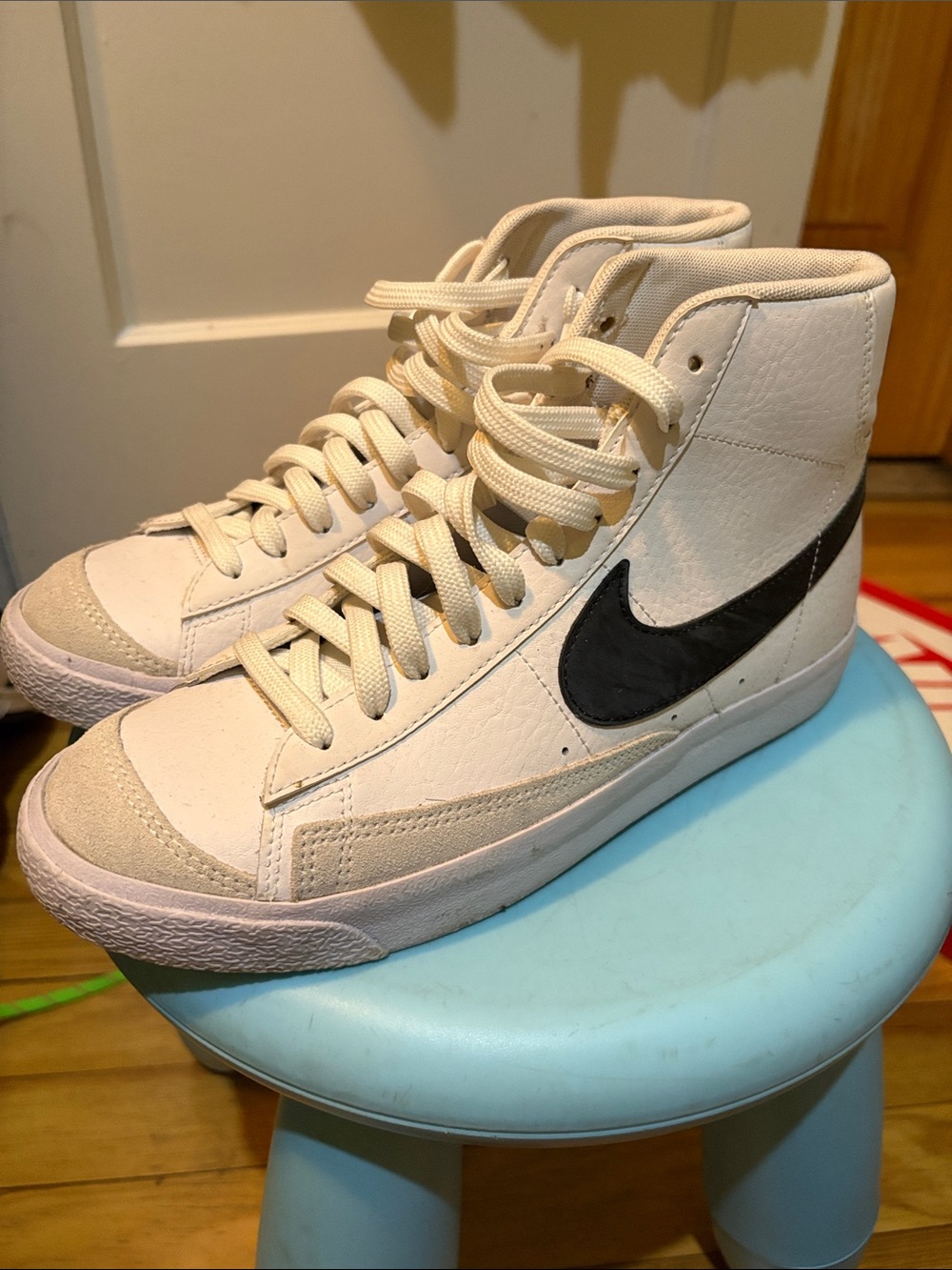 Nike High-Top Sneakers in Cream with Black Swoosh